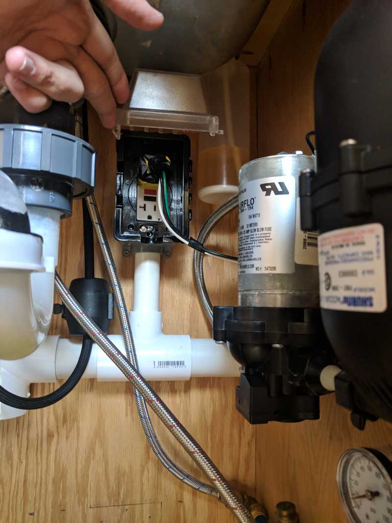 Waterproof power outlet under the sink